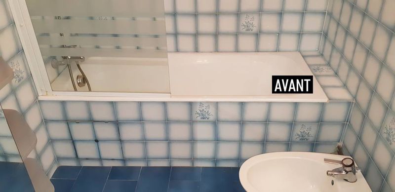 Ouverture de baignoire avec portillon anti éclaboussures