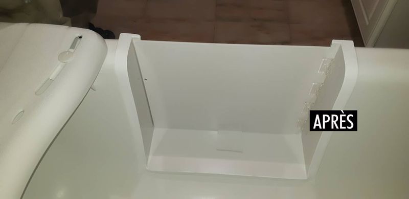 Ouverture de baignoire en fonte avec portillon anti éclaboussures